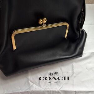 Coach Kisslock Frame Leather Backpack